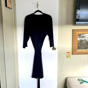 Wrap around dress with long tie.